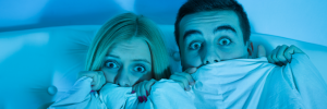 Halloween - scared couple hiding
